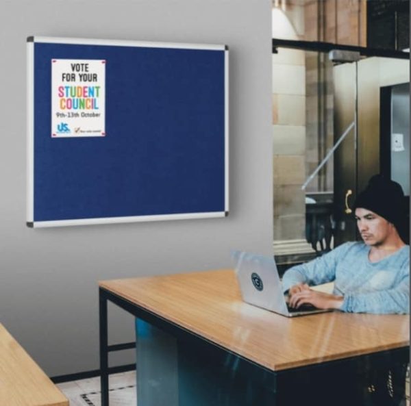 Fire resistant notice board with stylish aluminium frame and safety corners.