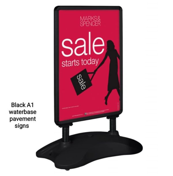 Black Pavement Sign with a water or sand filled base and robust wheels,